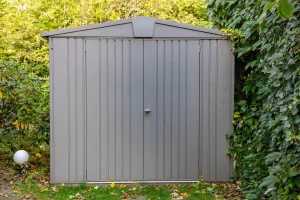 Durable metal storage shed installed in a residential backyard in Lethbridge