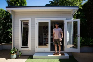 Custom backyard shed and detached garage comparison on a residential property in Lethbridge