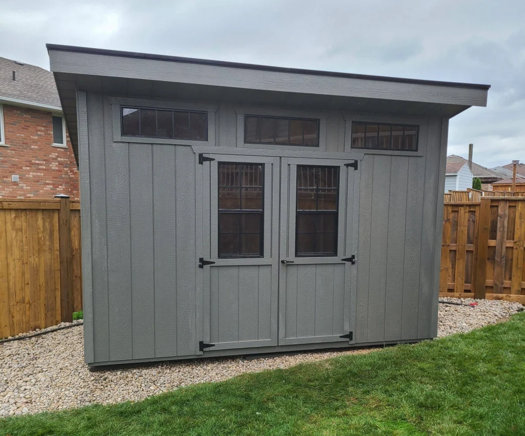 Grey single slope shed in Lethbridge