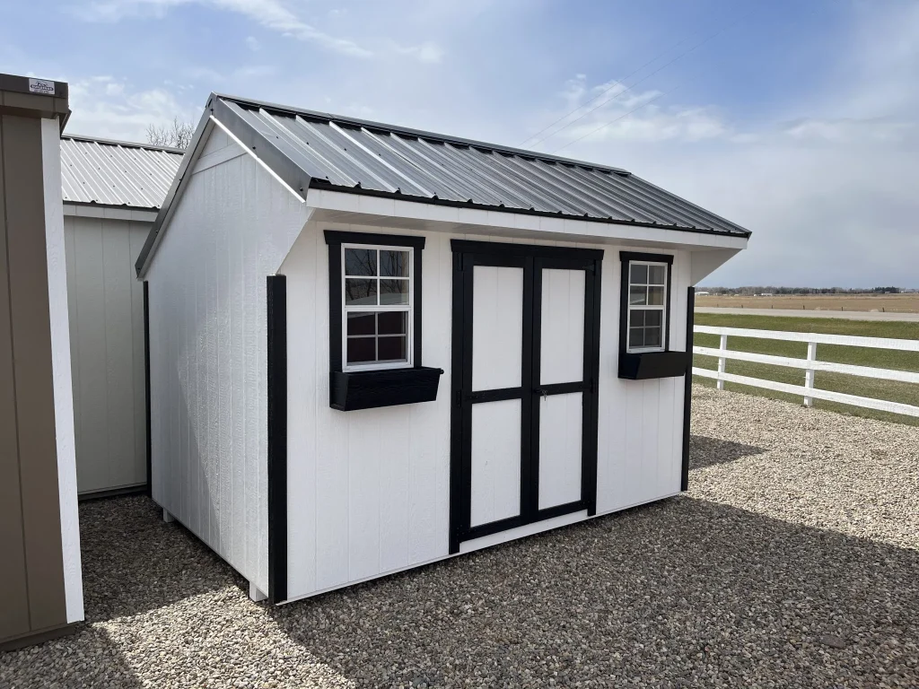 White carriage shed with black trim